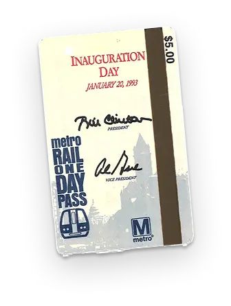 A commemorative Metro rail pass from January 20, 1993, marked "Inauguration Day," signed by Bill Clinton and Al Gore, featuring the Metro logo and a $5.00 fare.