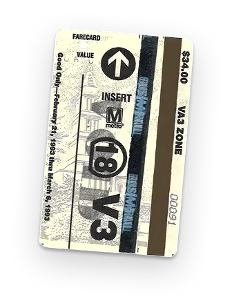 A vintage Metro farecard illustrating the design from February 21, 1993, featuring a black and white drawing of a cityscape, the Metro logo, and fare details. The card indicates a value of $1.00 and is marked for "VA 3 ZONE" with a directive to insert into a ticket machine.