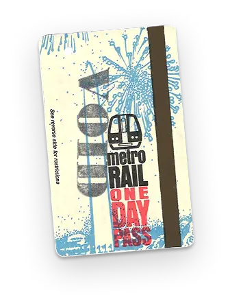 A vintage Washington DC Metro One Day Pass featuring a graphic of a train and colorful, abstract designs, celebrating the Metro system's 50th anniversary.