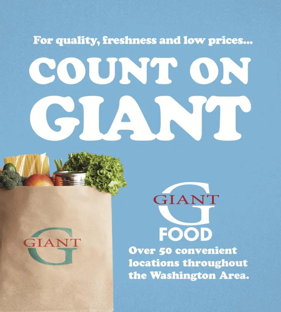 A paper grocery bag filled with fresh produce, including fruits and vegetables, set against a light blue background. The bag features the Giant Food logo prominently, along with the text "COUNT ON GIANT" and information about over 50 convenient locations in the Washington area, highlighting the store's commitment to quality and low prices.