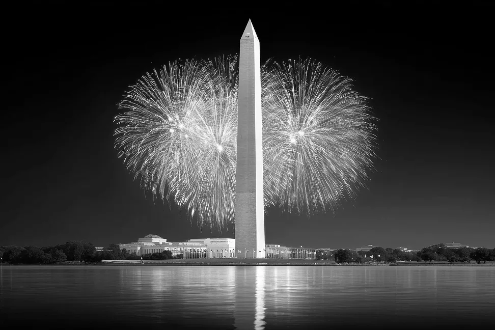 The Washington Monument surrounded by colorful fireworks, reflecting in the water below, celebrating the 50th anniversary of the Metro system in the Washington DC region.